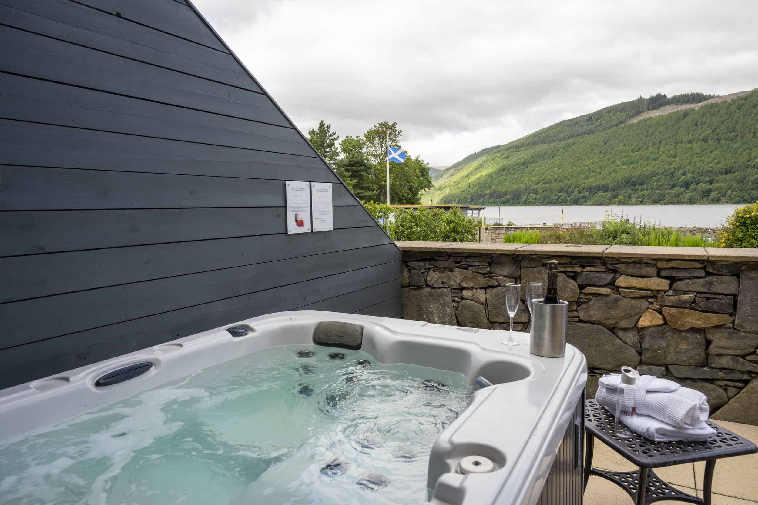 Hot tub on private terrace overlooking loch